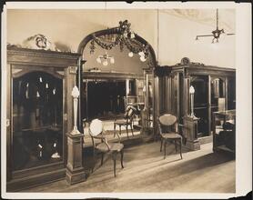 [Interior, clothing store.]