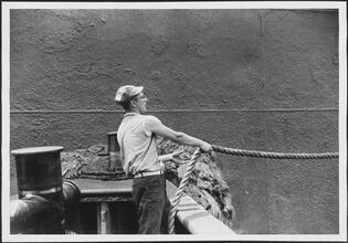 [Crew member on the ferry.]