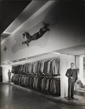 [Interior of Crawford Store with mannequins and suit jackets.]
