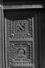 [20 Exchange Place, entrance with transportation motif.]
