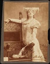 [Ada Rehan as Portia in "The Merchant of Venice".]