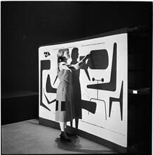 Museum of Modern Art [Staff members and art installations.]