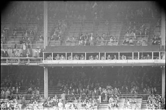 Football Writers [Fans in the stadium.]