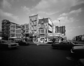 [East side of Bowery at the intersection of Delancey Street.]