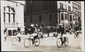 [Bicycle parade down 5th Avenue.]