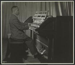 New York Association for the Blind, Interior, Colored Man Playing Organ.