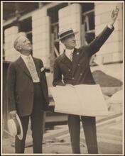 [Al Smith and another man at the State Office Building.]
