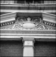 [Ornamentation on unidentified building.]