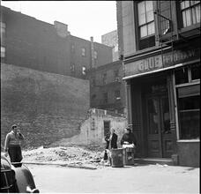 People and a Vacant Lot
