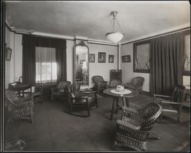 [Residence. Interior, parlor.]