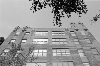 [Façade of an unidentified building.]