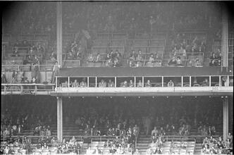 Football Writers [Fans in the stadium.]