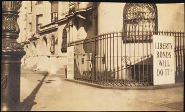 Street Scenes, etc. Showing Displays of Liberty Loan Posters during World War I [Liberty Loan posters on a fence at Riverside Drive and 80th Street,]