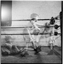 Boxing [at the] Police Athletic League [Two boys boxing.]