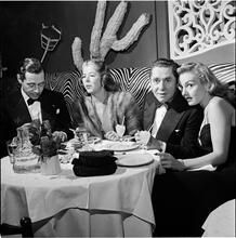 Circus [Two couples eating dinner.]