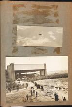 [Airplane; crowd at an airplane hangar.]