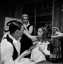 Beaux Arts Ball [Members of the Architectural League of New York putting on makeup at a costume party.]
