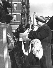 Untitled [Man in turban surrounded by onlookers]