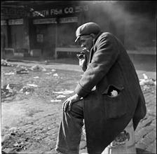 Waterfront. [Man smoking.]