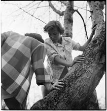 Betsy Von Furstenberg [Climbing a tree.]