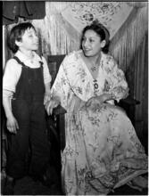 [Woman with a boy.]