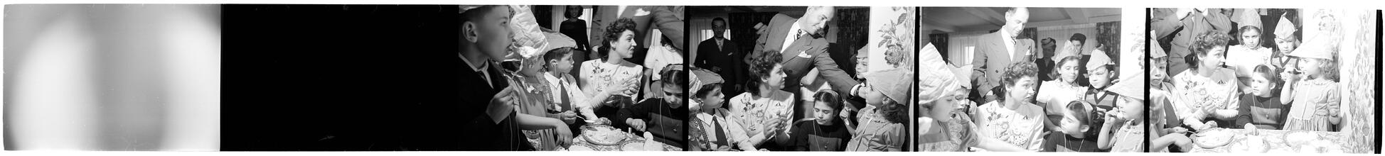 Deaf Children [Children eating cake at a party.]