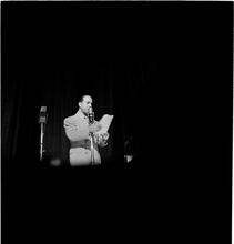 Swing Band Contest Sponsored by LOOK [Man on stage.]
