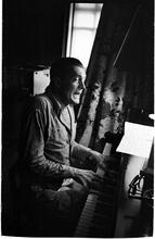 Peter Arno [Arno playing piano.]