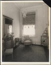 [Residence. Interior, with chairs and mantel.]