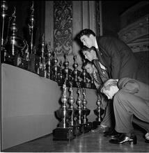 Swing Band Contest Sponsored by LOOK [Four men looking at trophies.]