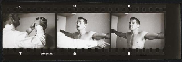 Rocky Graziano, He's a Good Boy Now [Rocky Graziano being examined before a fight.]