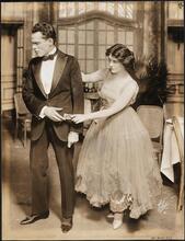 ["The Man Who Came Back" theater still.]