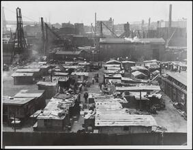 [Aerial View of Hard Luck Town, a shantytown.]