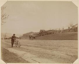[Riverside Drive, with man and bicycle.]