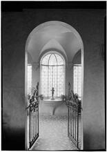 Hugh Baker [residence]. Sun room through arch.