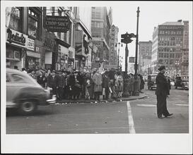 [Street corner of East 14th Street.]
