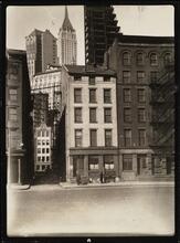[Corner of South Street and Jones Street, Woolworth Building in background.]