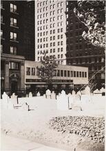 [St. Paul's Churchyard, looking toward F.W. Woolworth store.]