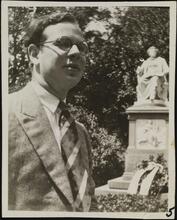 [Abraham Ellstein in front of Franz Shubert monument in Vienna.]