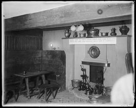 Lambs Club. Dining booth and hearth.