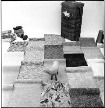 Salvador Dali: Rugs [Lamb in a display of rugs and materials that rugs contain.]