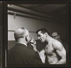 Rocky Graziano, He's a Good Boy Now [Rocky Graziano with two men.]