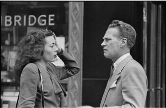 Street Conversations [Man and woman talking on the street.]