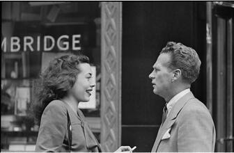 Street Conversations [Man and woman talking on the street.]