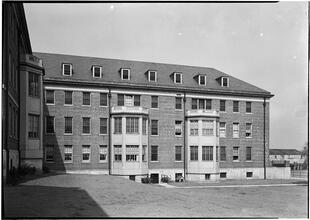 Officer's apartments, Governors Island, N.Y. Court view.