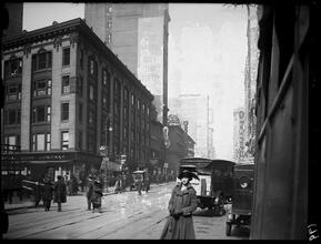 Broadway Series. View showing west side of Broadway, looking north from 27th Street Regal Shoe Co., at left on corner. 5th Avenue Theatre (Proctors) in middle distance, corner of 28th Street.