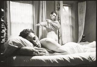 Walter Cartier, Prizefighter of Greenwich Village [Walter Cartier getting dressed as Vincent Cartier remains asleep.]