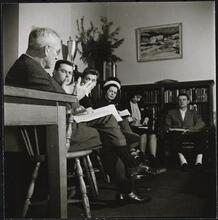 Columbia University [Professor with students in an office.]