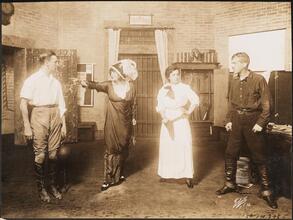 ["Believe Me Xantippe" theater still.]
