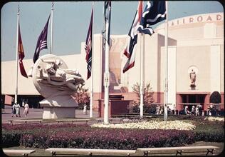 ["Spirit of the Wheel" statue in front of the Railroad Building.]